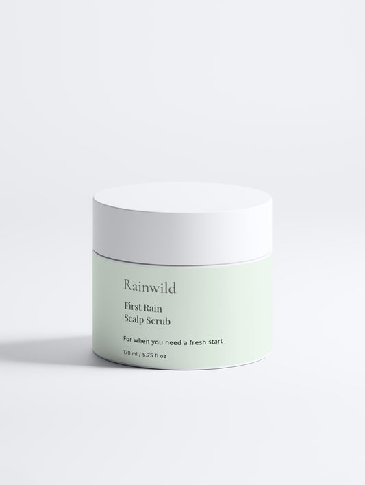 Jar of Rainwild First Rain Scalp Scrub on a light gray background
