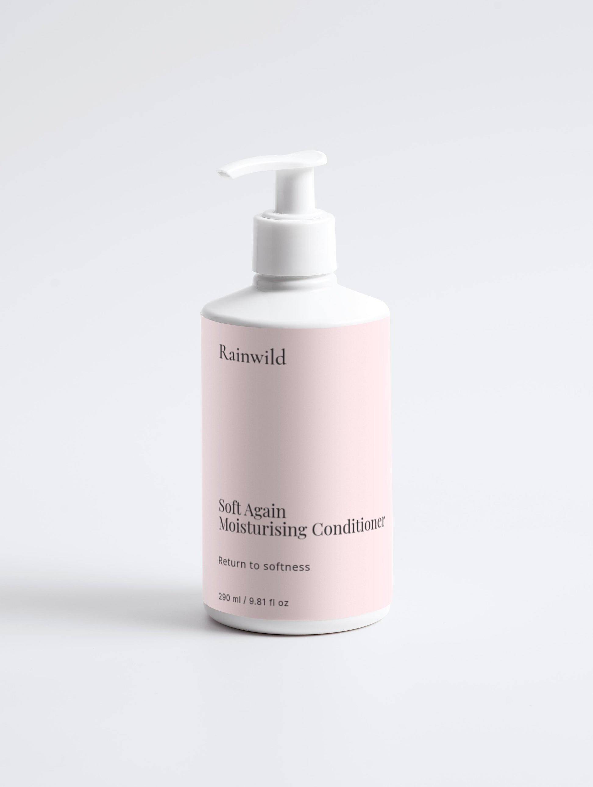 Pink bottle of Rainwild Soft Again Moisturising Conditioner on a light gray background